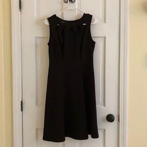 Black sleeveless flare dress with cut out neckline